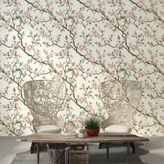 Beautiful soft pink sakura botanical wall mural sticker enhances living room wall decor.