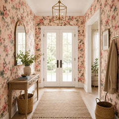 Full wall view of blush songbird wallpaper in living room, elegant floral accent wall