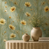 Buttercup meadow wallpaper styled behind a decor stand with vases and books