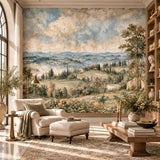 Living room with ottoman and bookshelves before a Tuscan rolling hills wall mural