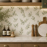Texture close up of olive branch watercolor wallpaper with a matte surface.