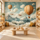 Playroom table with wooden toys against a removable sky adventure nursery mural