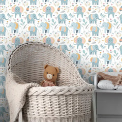 Beautiful pastel baby elephant kids room nursery wallpaper adds warmth.