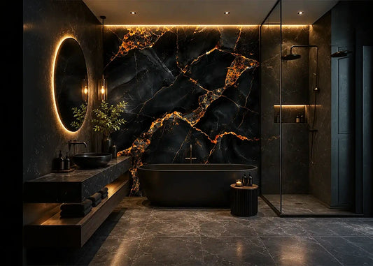 Black and gold marble effect mural wall in a luxury dark bathroom with a freestanding tub