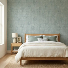 Botanical linen peel-and-stick wallpaper styled with natural wood furniture, earthy room