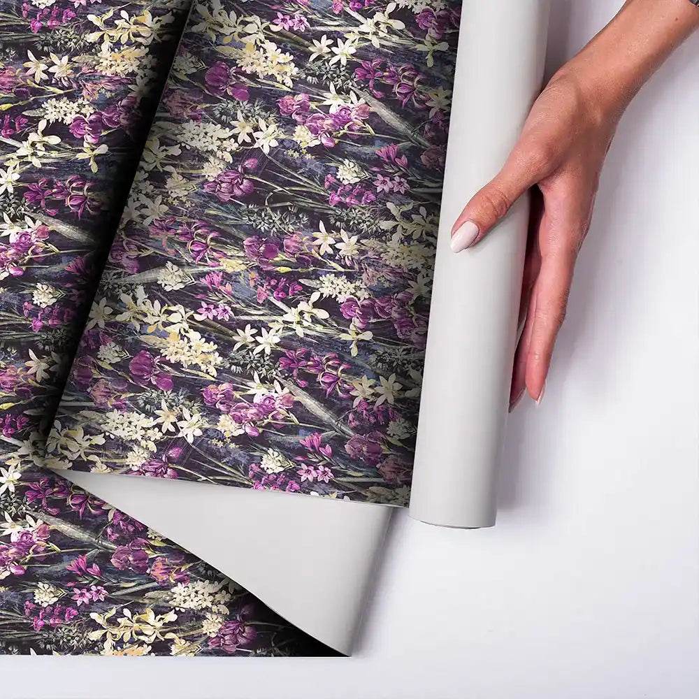 Comfortable midnight orchid floral wallpaper balances dark interior tones.