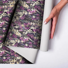 Comfortable midnight orchid floral wallpaper balances dark interior tones.