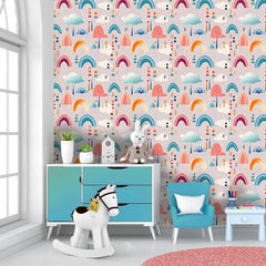 Comfortable pastel rainbow and cloud kids room nursery wallpaper feels gentle.