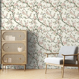 Comfortable soft pink sakura botanical wall mural sticker for bedroom wall adds softness.