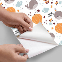 Elegant hello world whale and balloon kids room nursery wallpaper fits modern rooms.