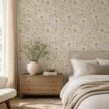 Pattern detail of ivory daisy meadow wallpaper showing petal and stem shapes.