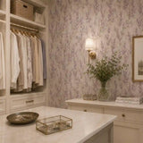 Pattern detail of lavender meadow botanical wallpaper and its purple blooms.