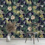 Midnight jungle floral wallpaper close-up with bold dark exotic flower and leaf detail