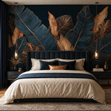 Dark palm leaf mural above a navy headboard in a moody masculine bedroom