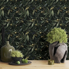Noir olive peel-and-stick wallpaper in living room, refined dark botanical feature wall