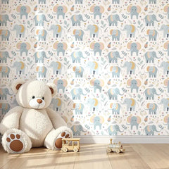 Pastel baby elephant kids room nursery wallpaper creates a soft playful mood.