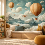Cozy reading nook daybed under a balloons and clouds kids room wall mural