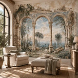 Sitting room with cream armchairs and an antique Italian arches landscape mural