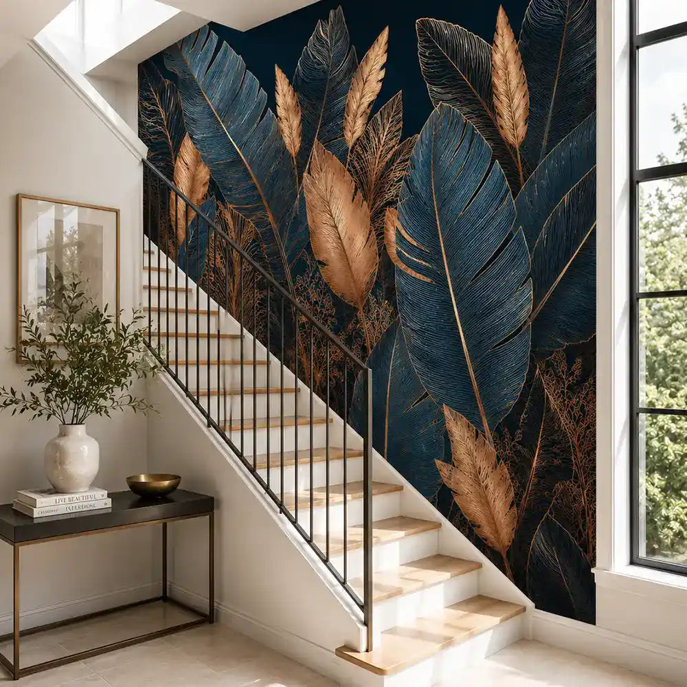 Dark palm leaf mural on a staircase wall with console table and white railing
