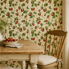 Removable botanical wallpaper with strawberry motif, installed in dining area