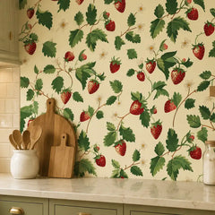 Close-up of strawberry blossom vine pattern showing leaf and fruit detail, sage green