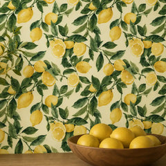 Sunlit lemon removable wallpaper sample tile, yellow and green citrus pattern detail